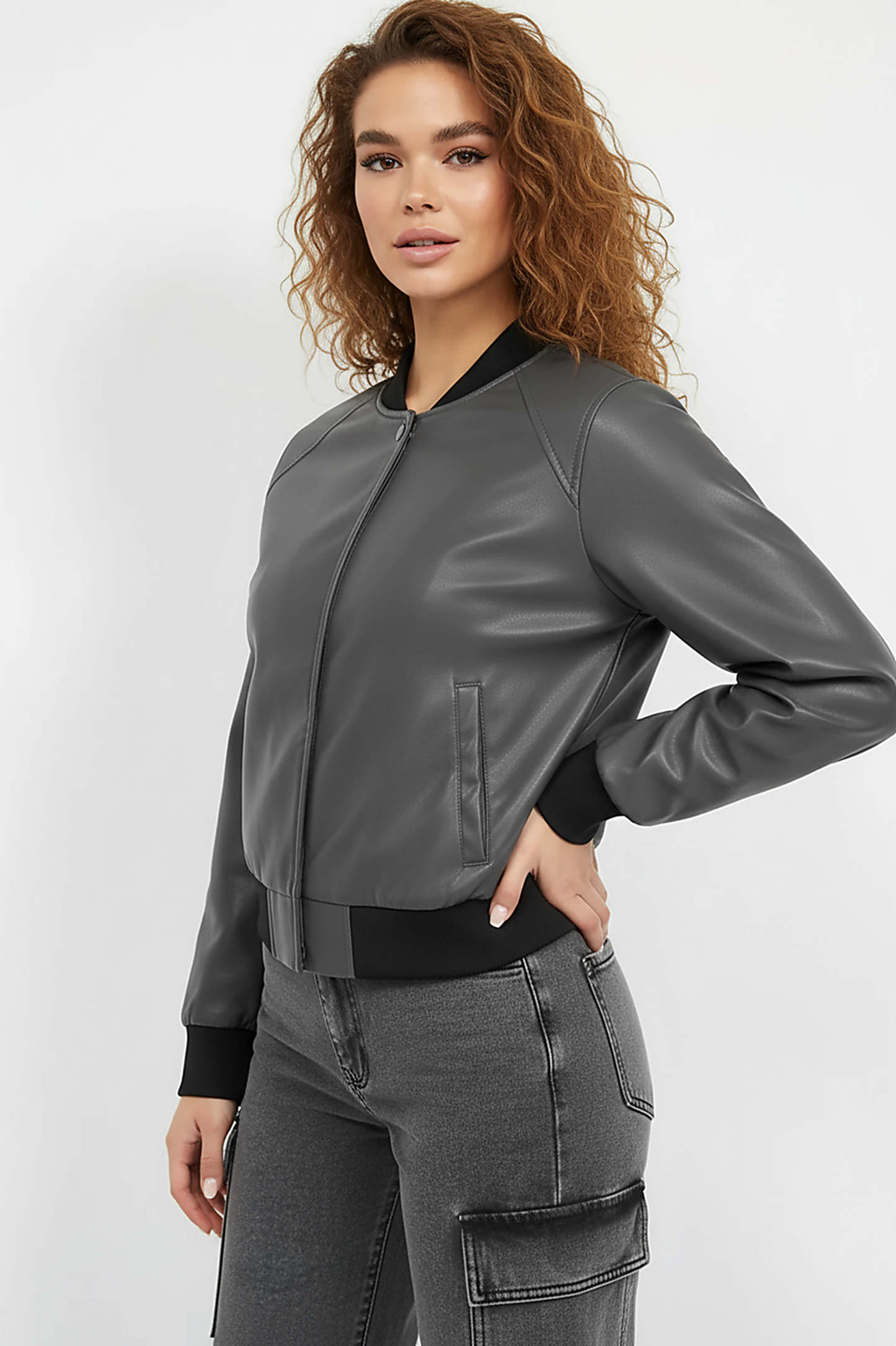 Black PU motorcycle jacket, angled front view on model.