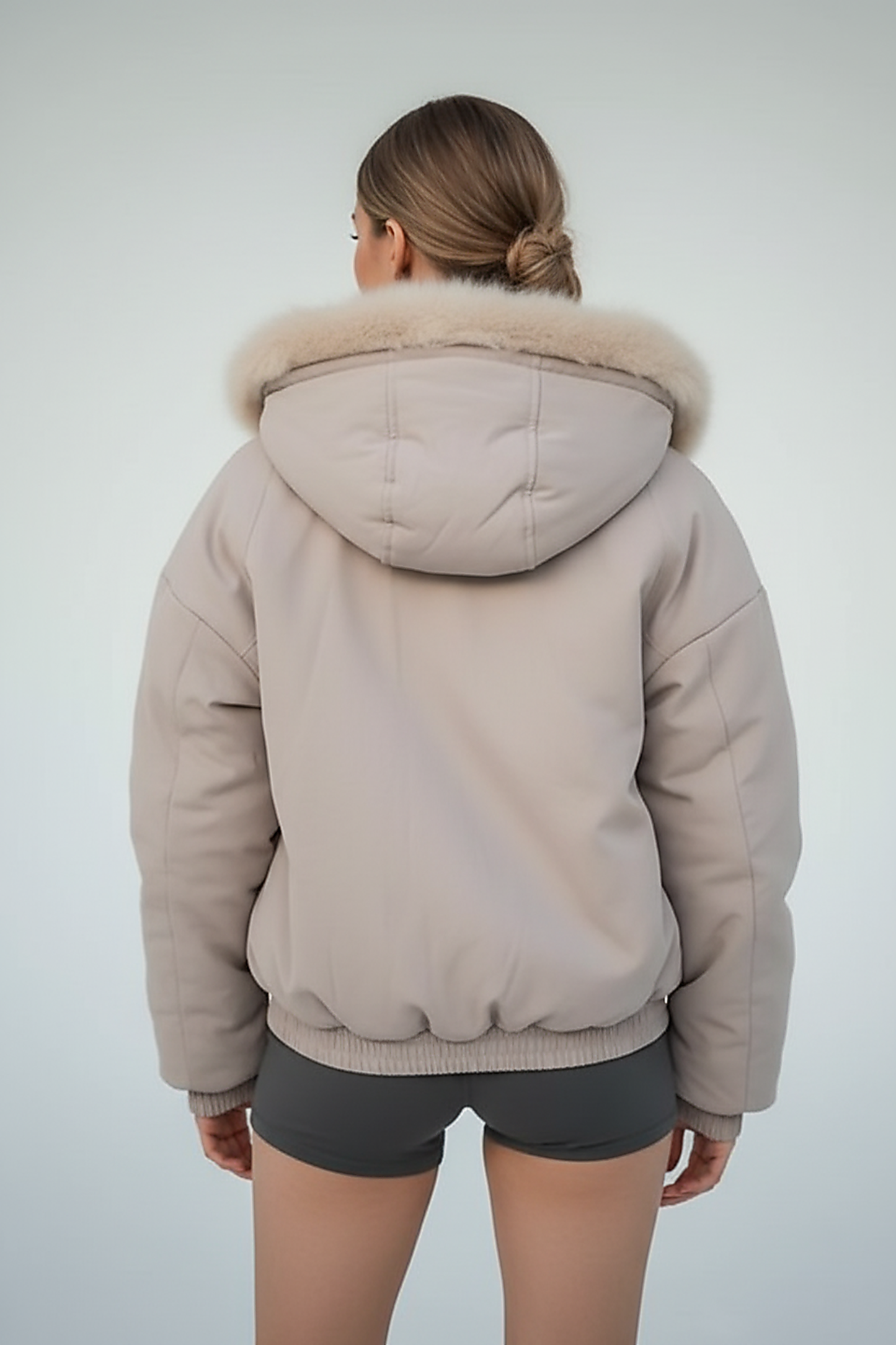 Black women's thickened fur-collar hooded jacket, fabric detail.