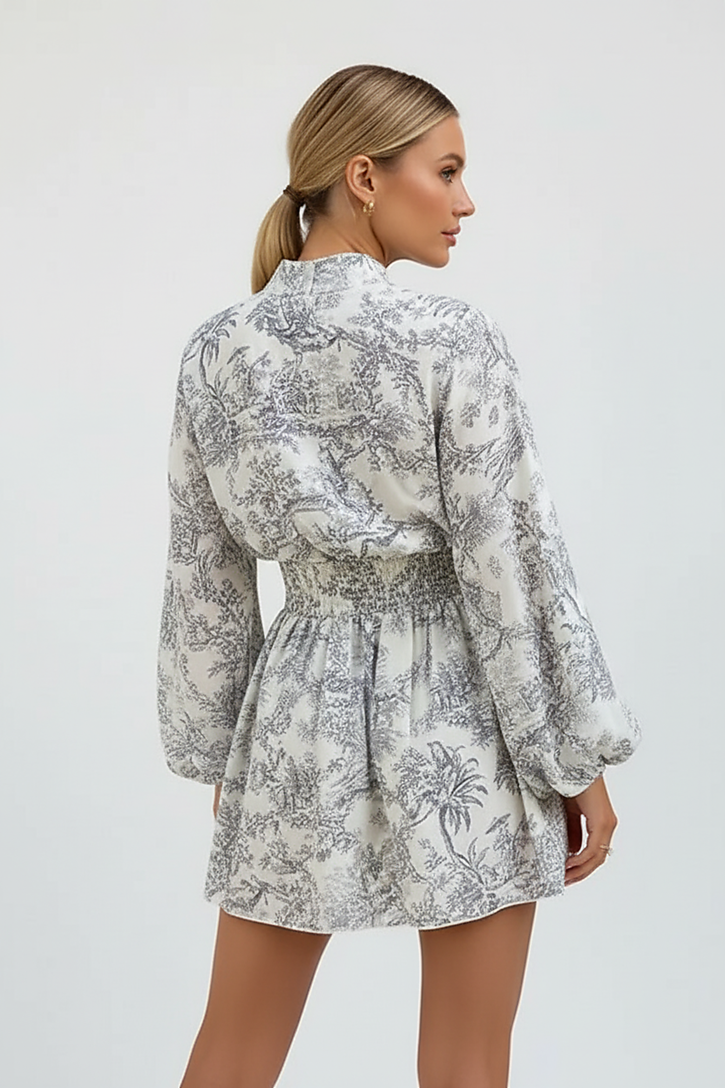 Elegant dress, back view on model.