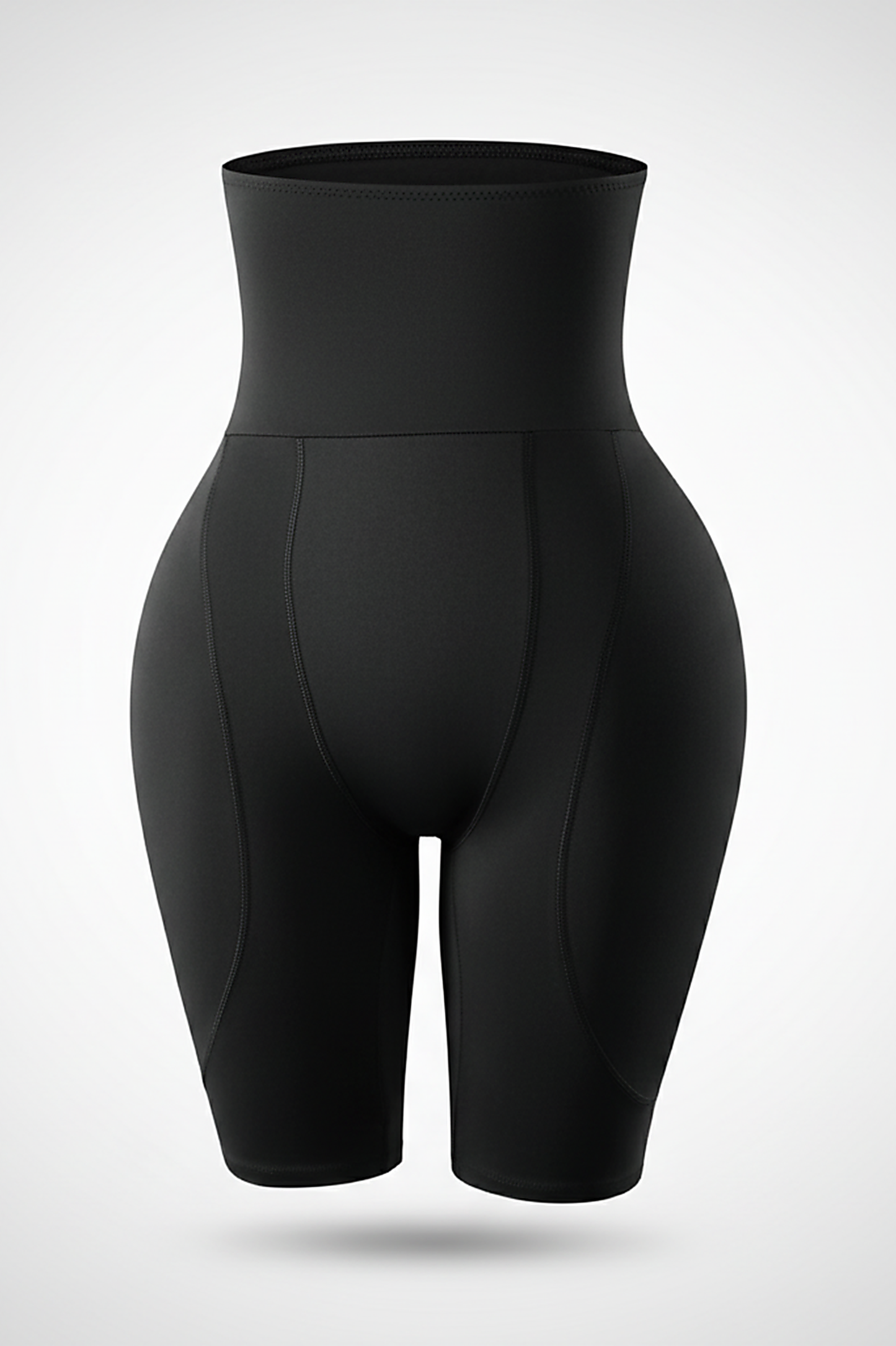 Black shapewear shorts, fabric detail close-up.