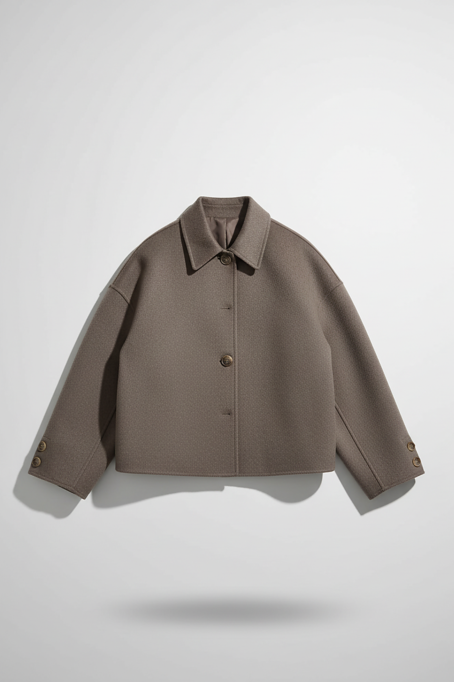 Solid wool jacket, fabric texture detail.