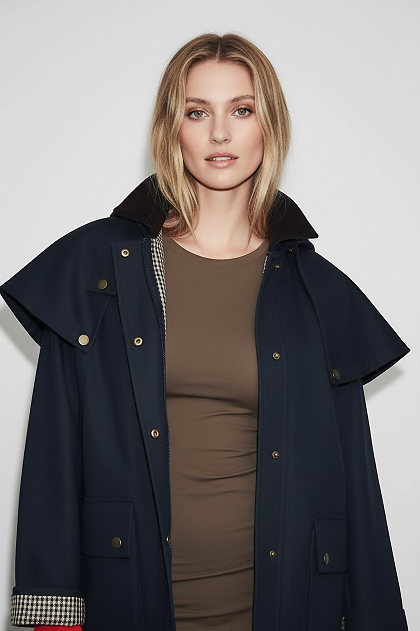 Removable hooded coat, laid flat, full length.