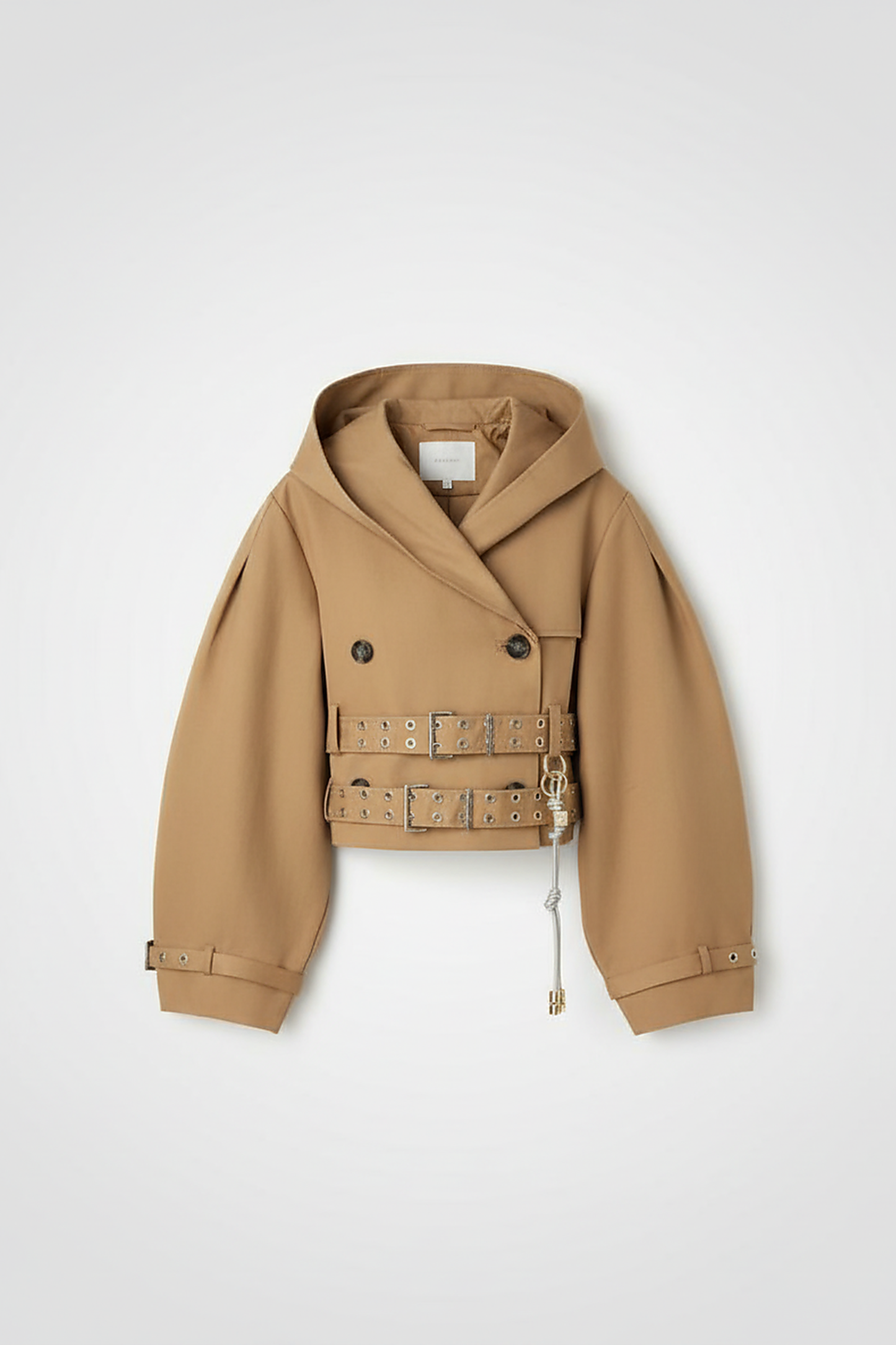 Black hooded crop trench coat, close-up of lapel.