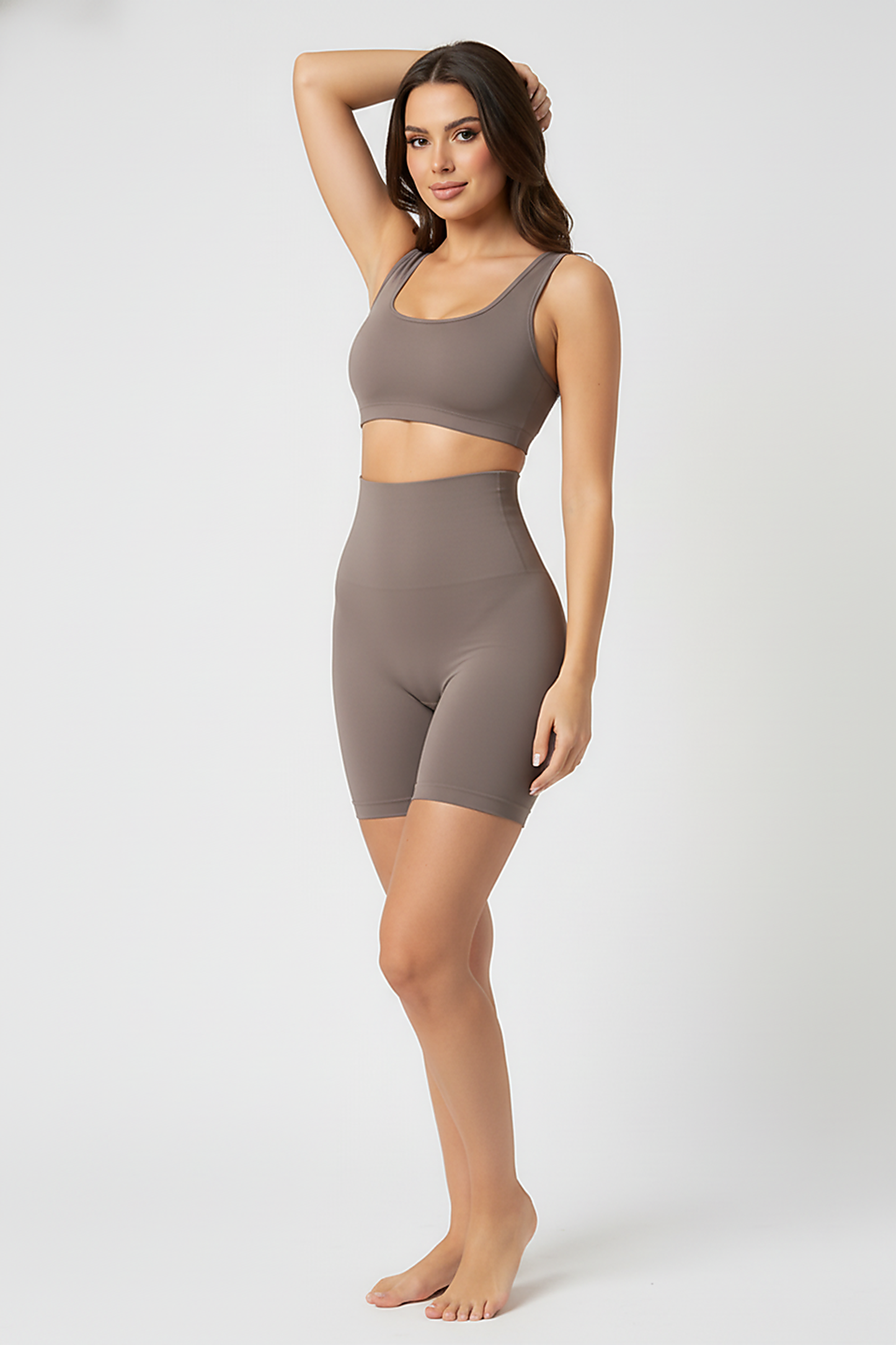 Black high-waist shaper, angled view on model.