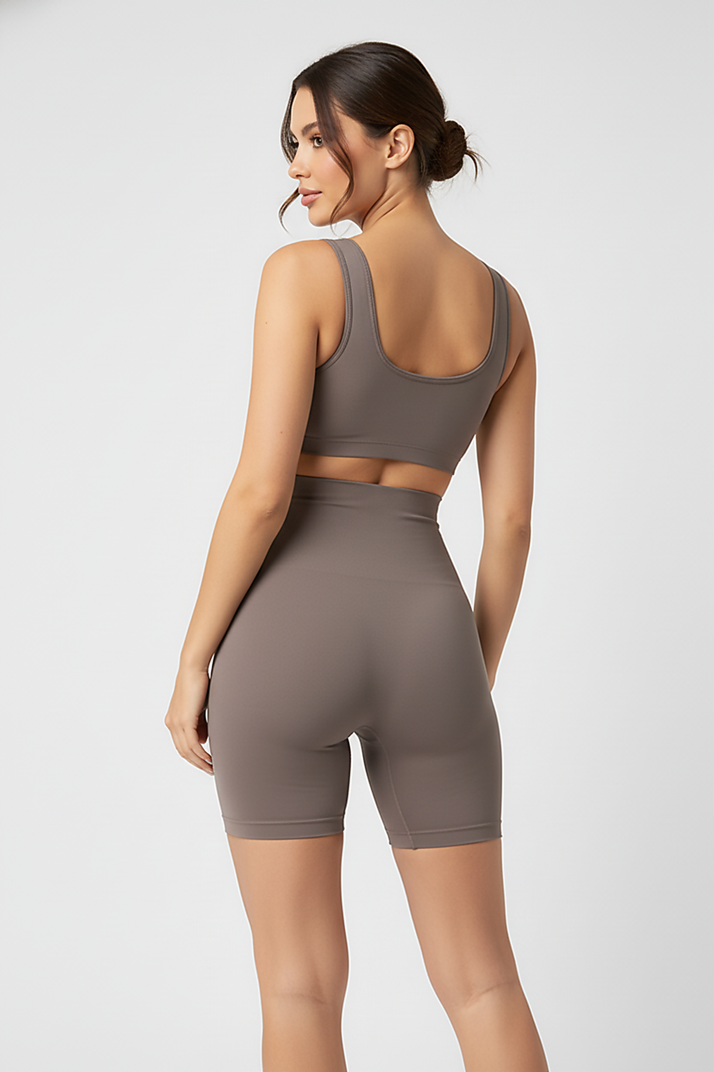 Black high-waist shaper, back view on model.