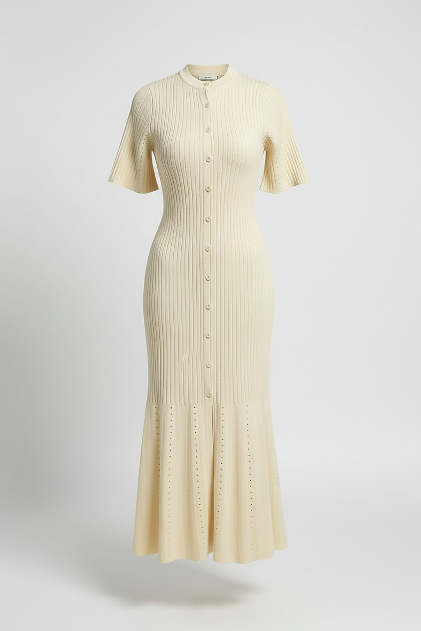 White knit long dress, short sleeve. Front view on model.