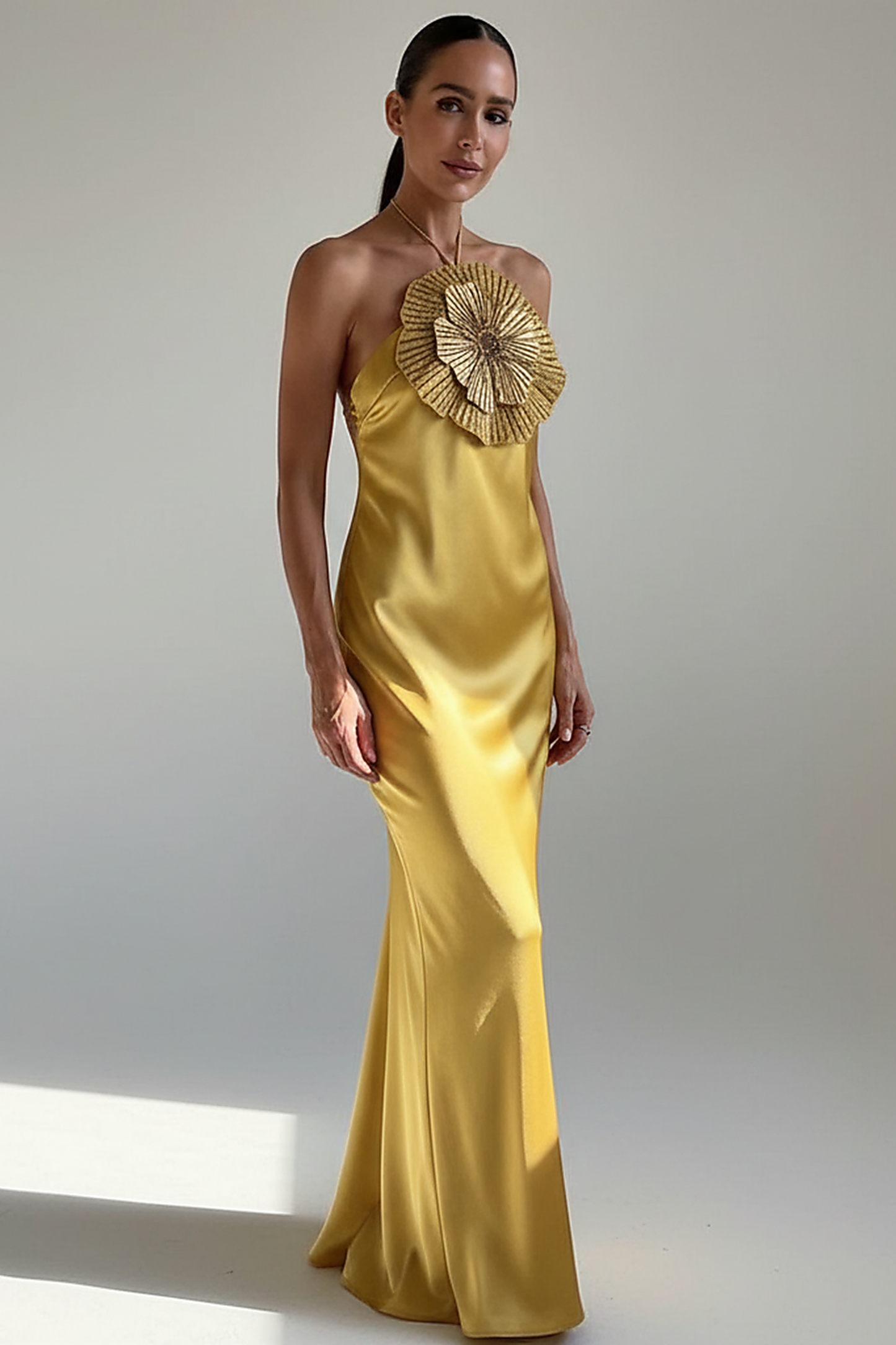 Halter mermaid satin dress with 3D flowers, front view on model.