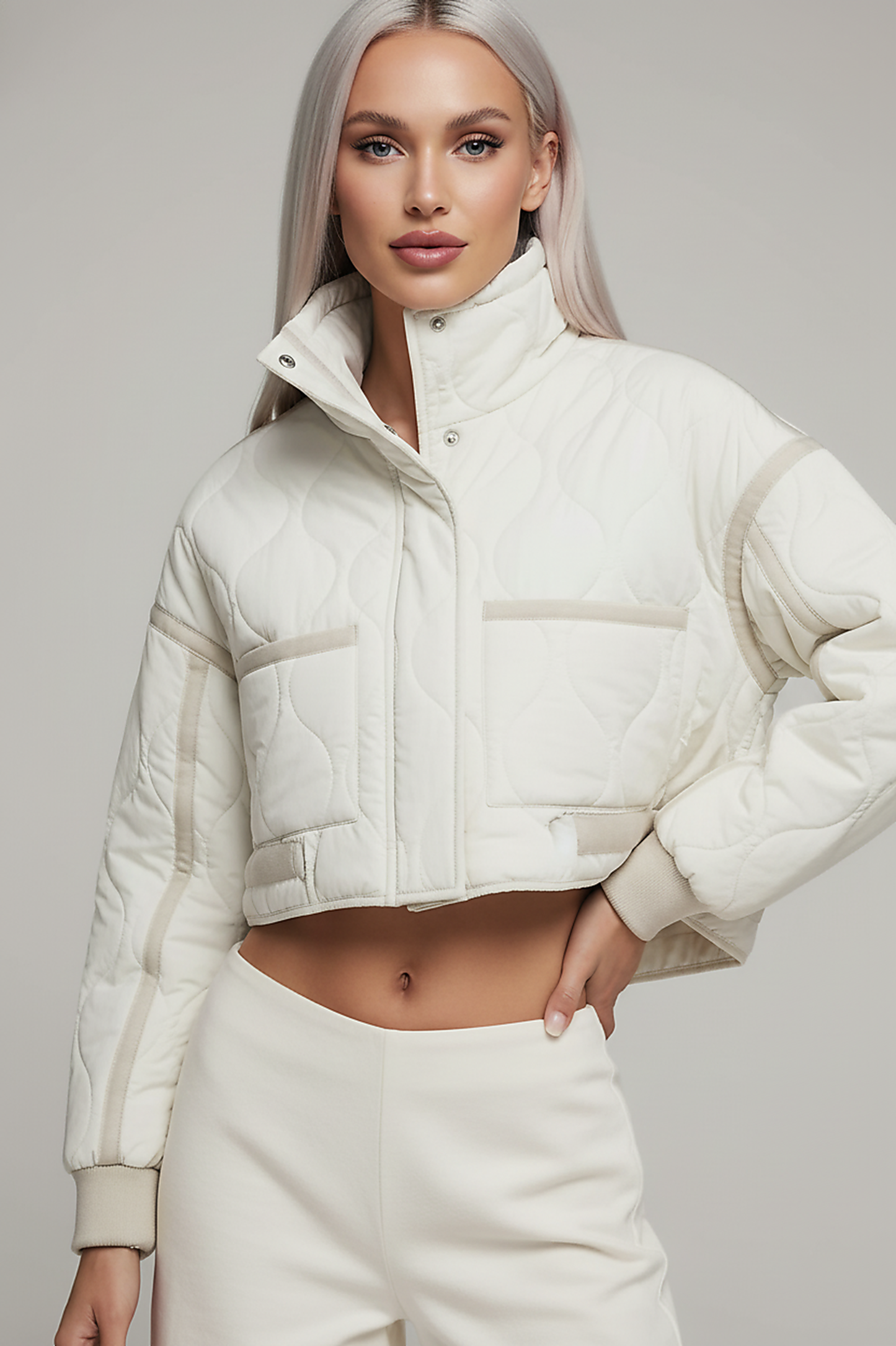 Stand-collar winter jacket, model in three-quarter pose.