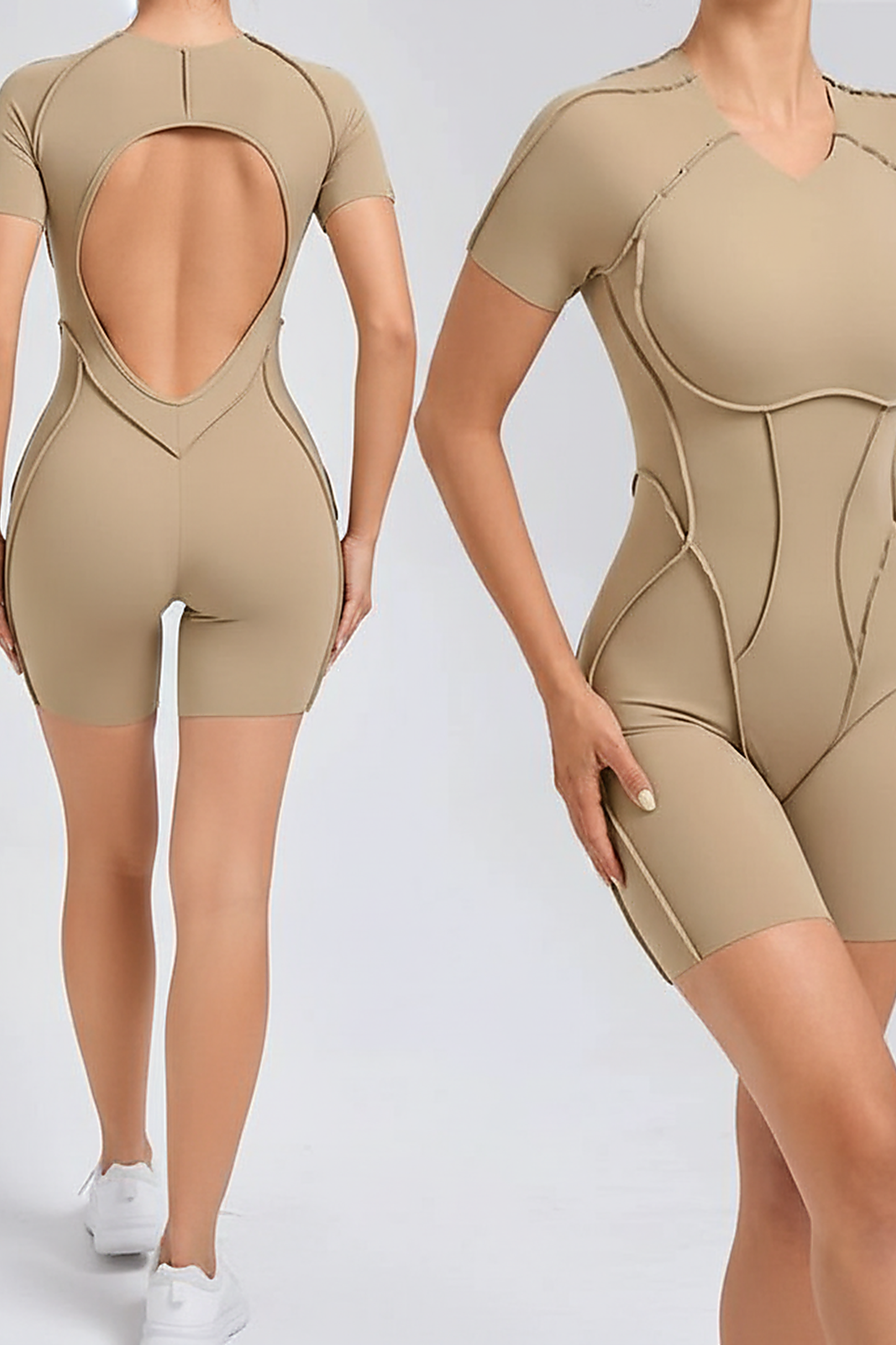 Black workout jumpsuit, close-up fabric detail.