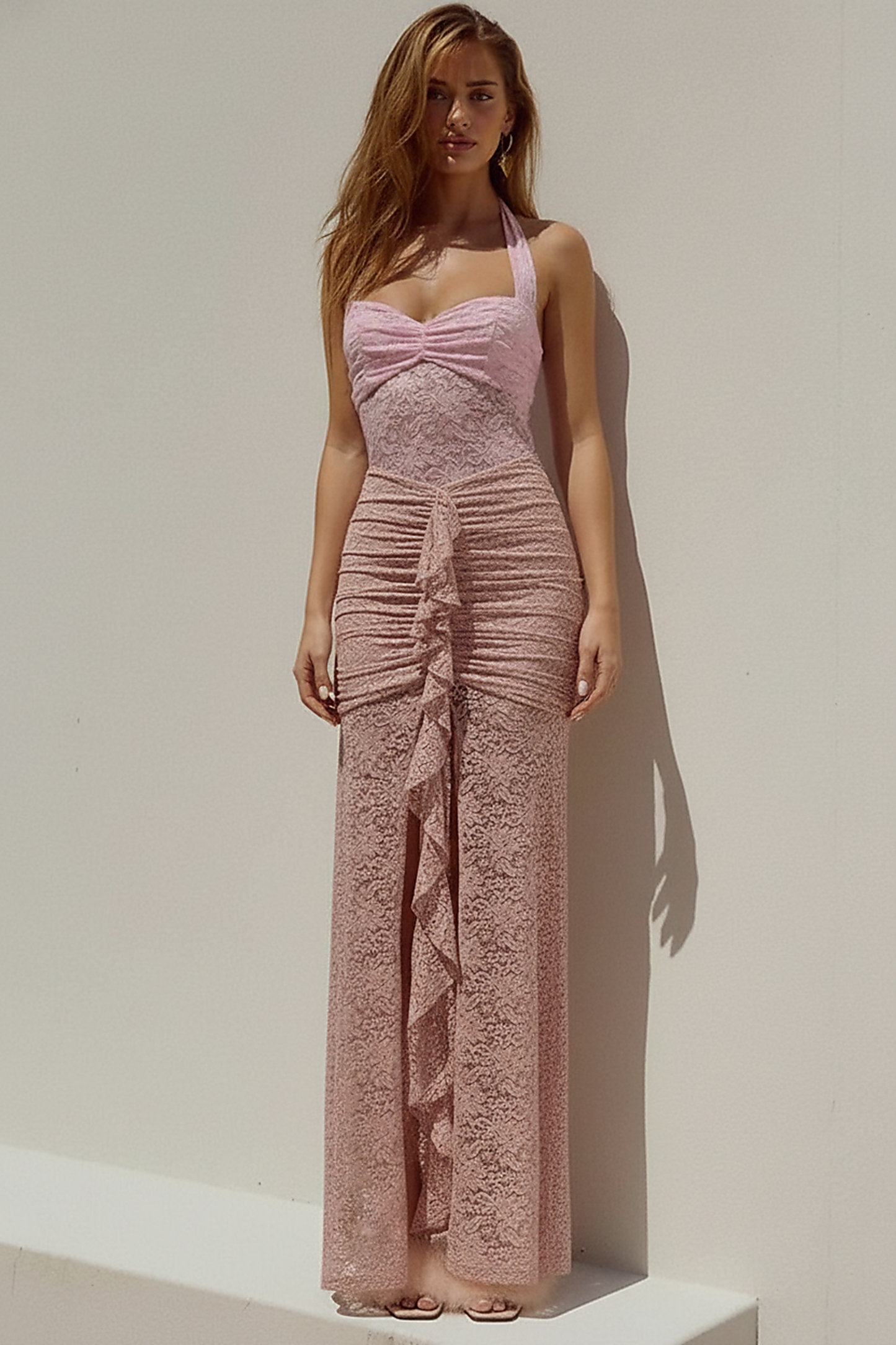 Black ruched maxi dress, front view on model.