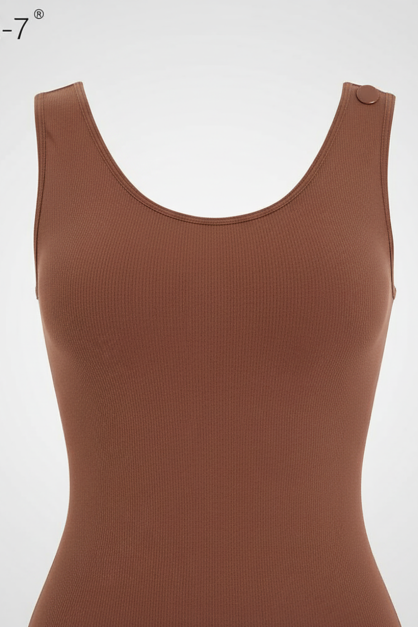 Slimming bodysuit, close-up fabric detail.