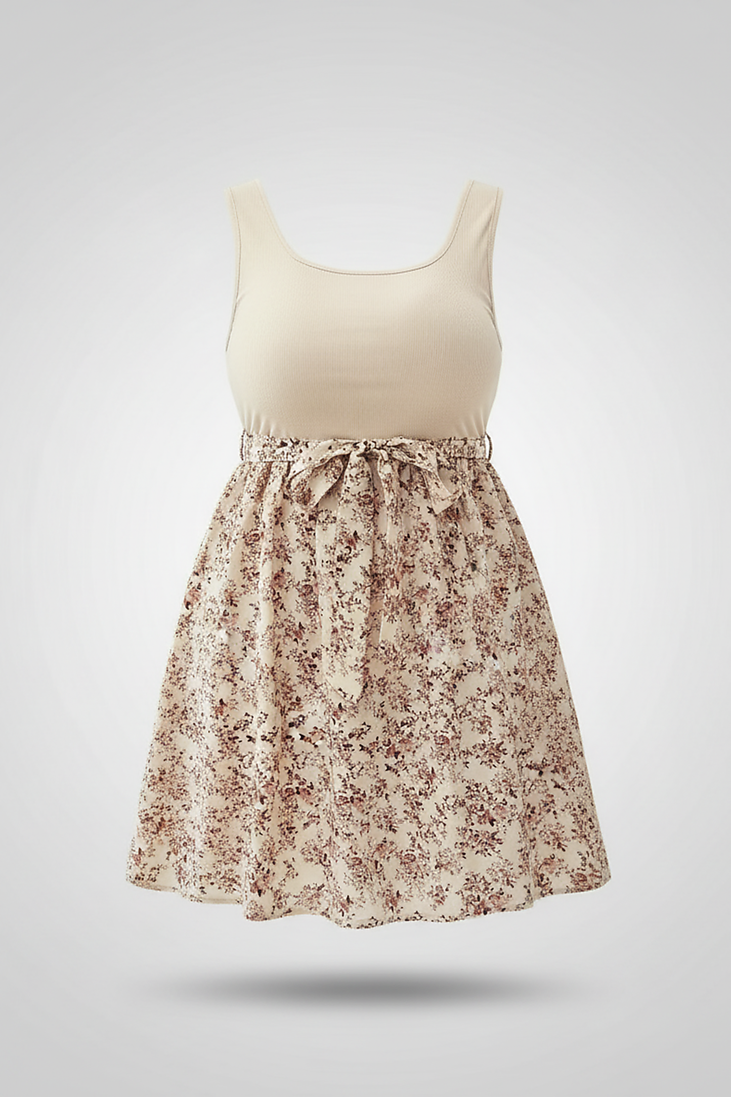 Plus-size knit floral sleeveless dress, casual elegant style, front view on model.