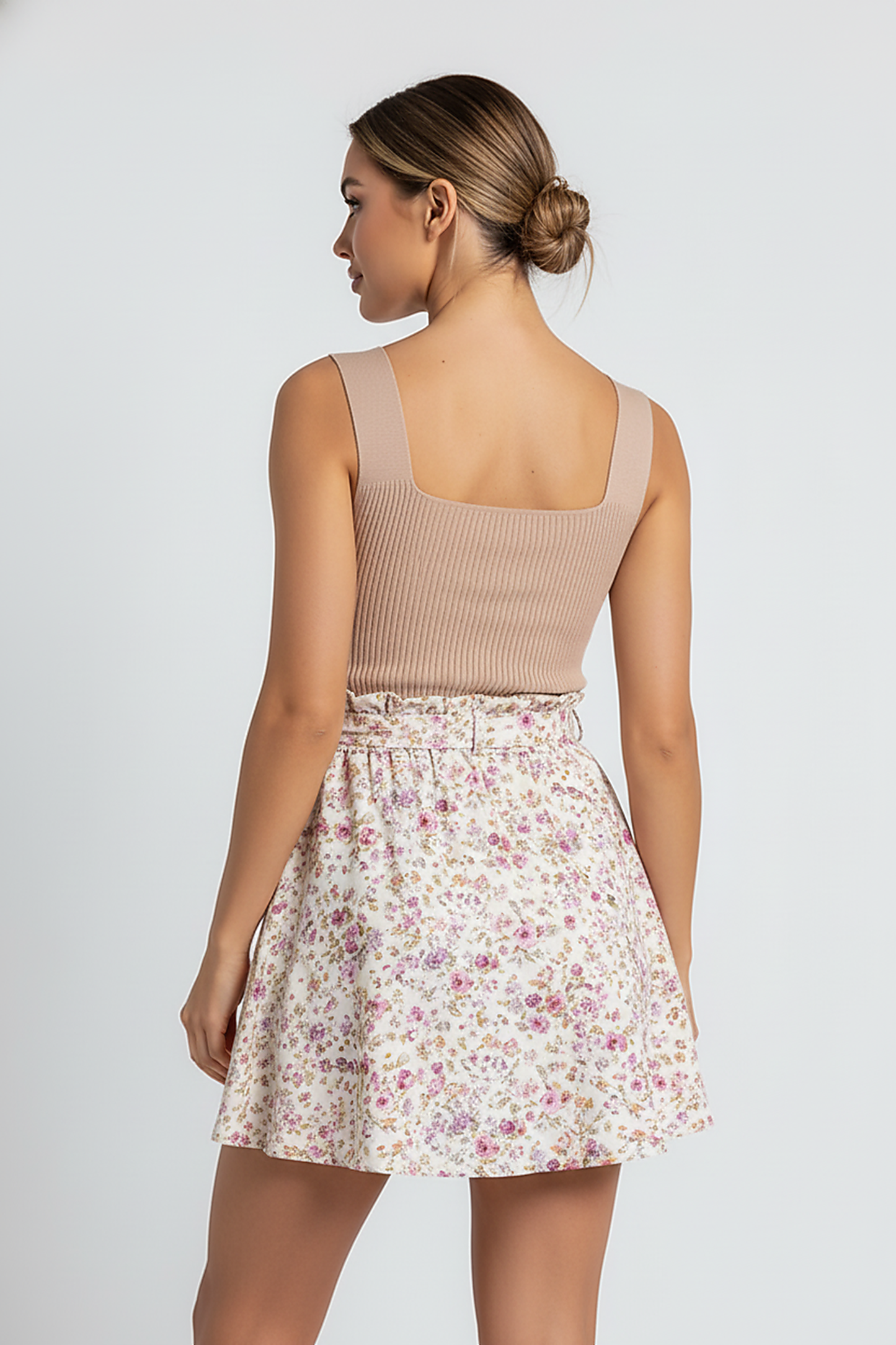 Plus-size floral knit sleeveless summer dress, chic style, front view on model.