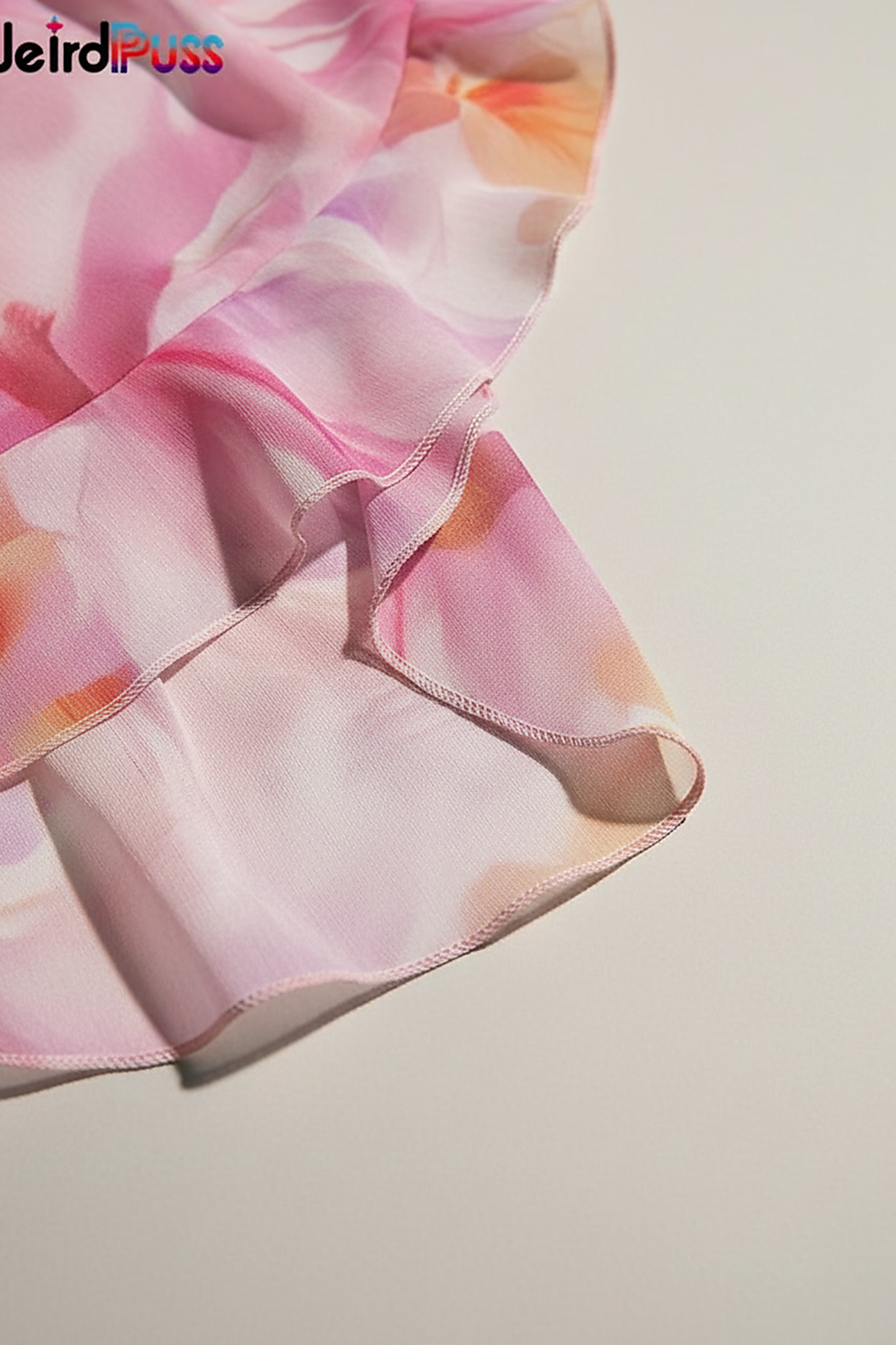 Floral print strapless bandage dress with irregular tassel patchwork, front view on model.