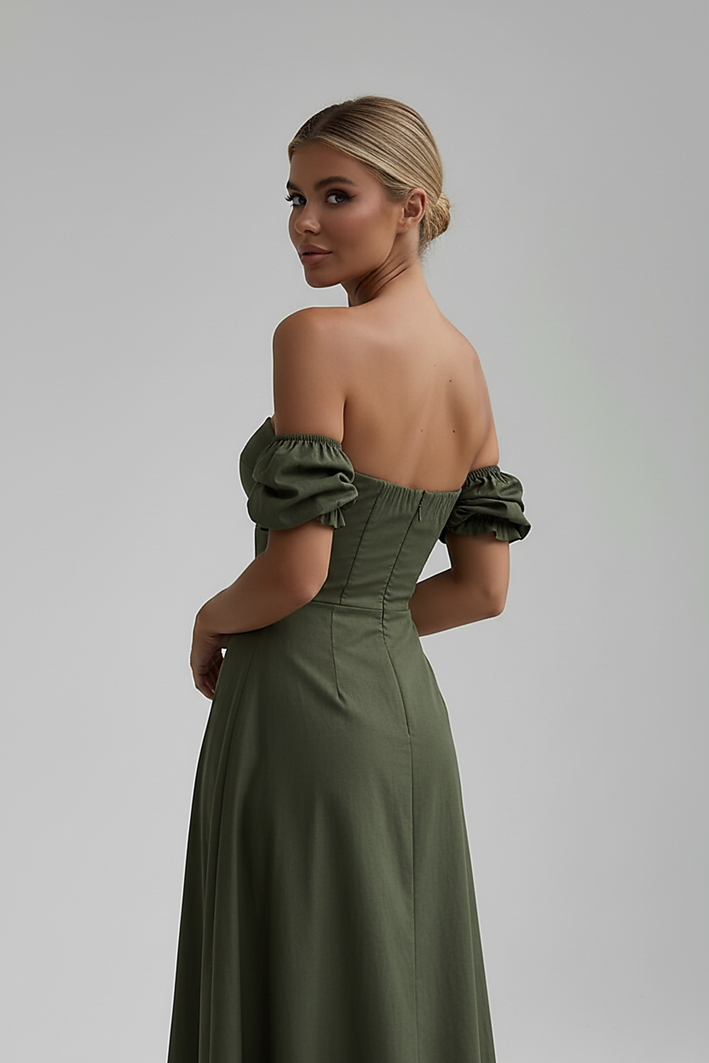 Floral off-shoulder maxi dress back view on model.