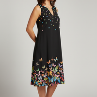 V-neck sleeveless patterned swing dress, front view on model.