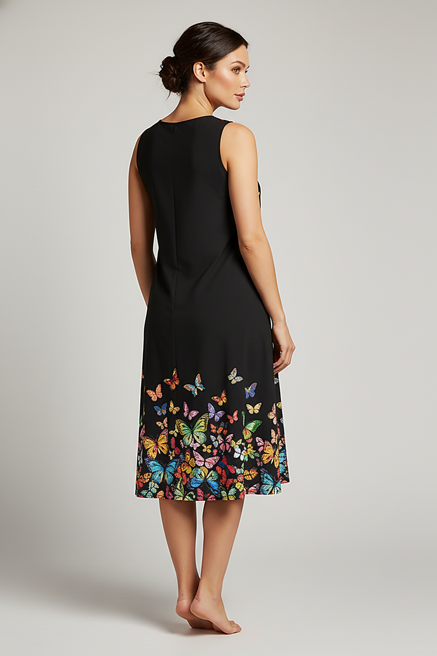 Printed V-neck sleeveless A-line dress, outdoor lifestyle view.