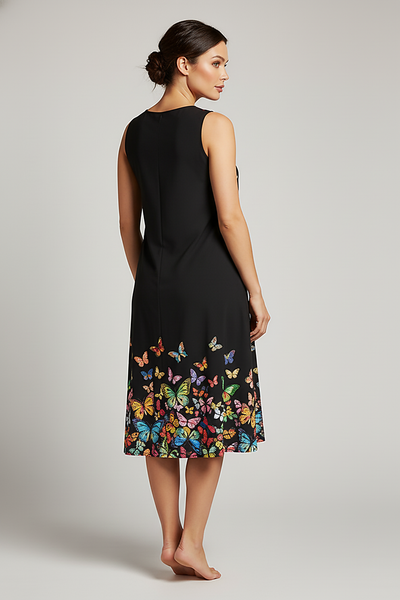 Printed V-neck sleeveless A-line dress, outdoor lifestyle view.