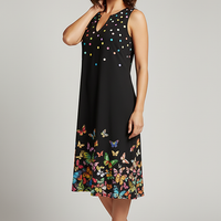 V-neck printed flowy vacation dress, outdoor lifestyle view.