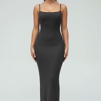 Black spaghetti strap long dress, back view on model.