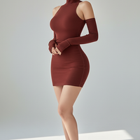 Sleeveless pleated mini dress with high-neck and lace-up, front view on model.