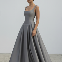 Polka dot maxi dress, lotus hem detail.