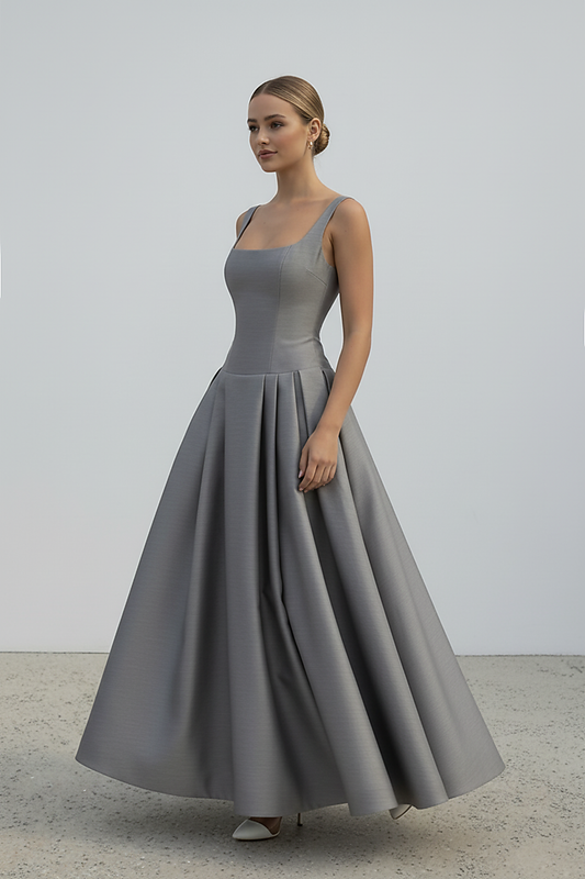 Polka dot maxi dress, lotus hem detail.