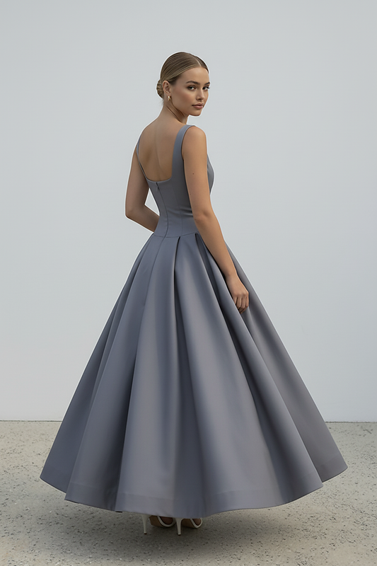 Polka dot maxi dress, fabric texture detail.