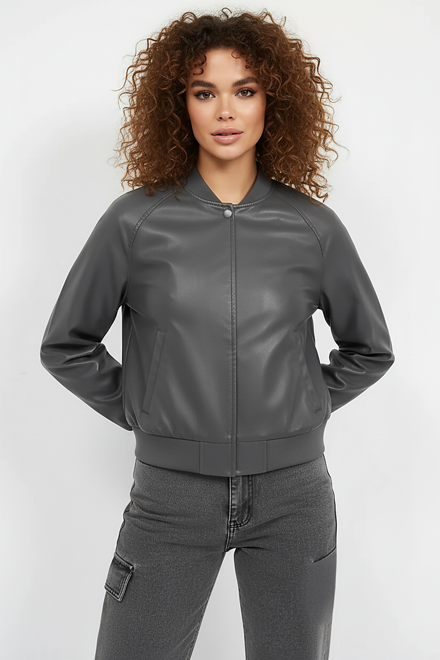 Black PU motorcycle jacket, back view on model.