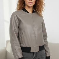 Black PU motorcycle jacket, waist hem detail.