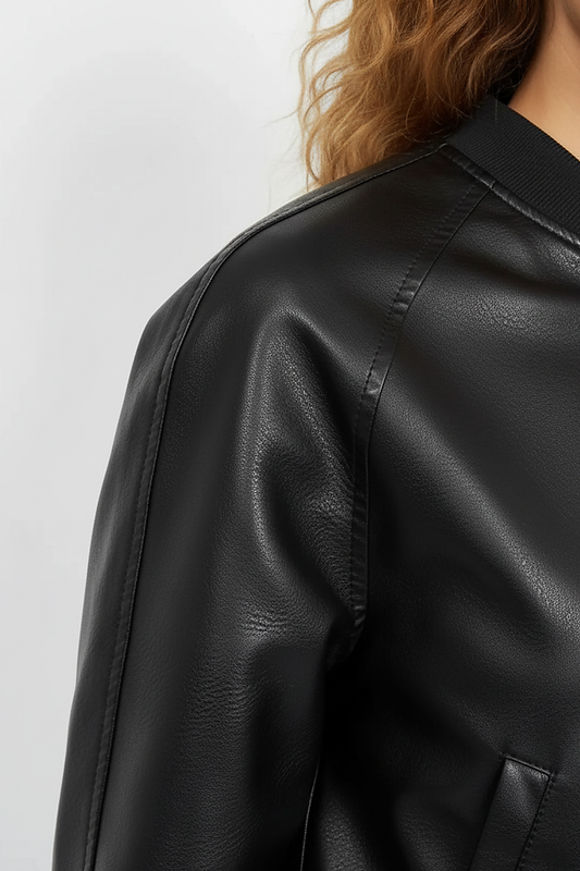 Black PU motorcycle jacket, side pocket detail.
