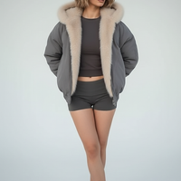 Gray women's thickened fur-collar hooded jacket, front view on model.