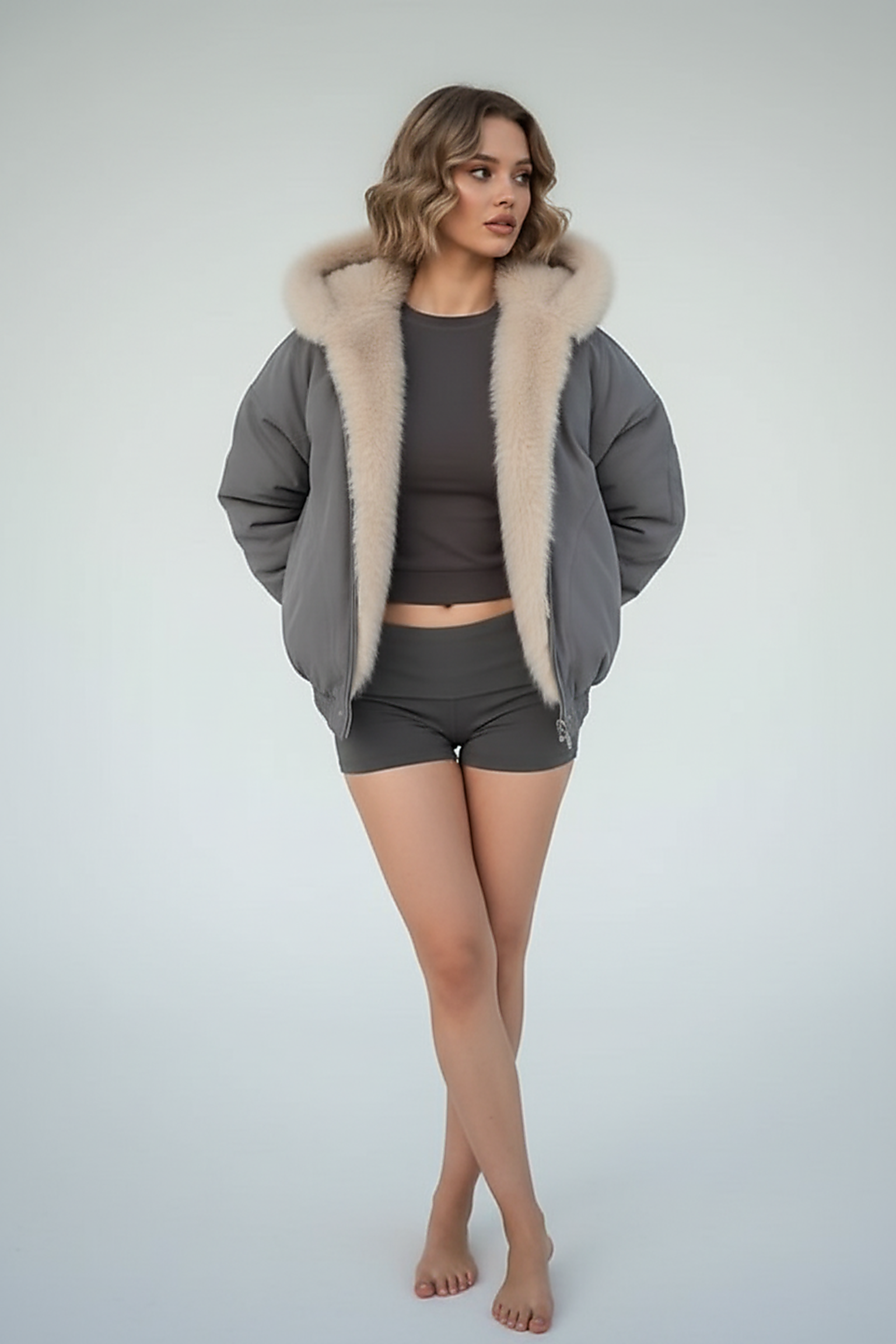 Gray women's thickened fur-collar hooded jacket, front view on model.