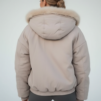 Black women's thickened fur-collar hooded jacket, fabric detail.