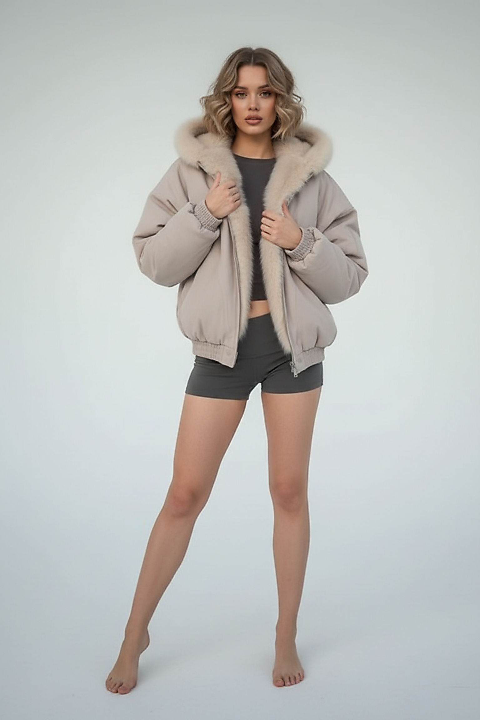 White women's thickened fur-collar hooded jacket, front view on model.
