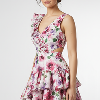 woman wearing purple tiered maxi dress, front view, standing, hands relaxed