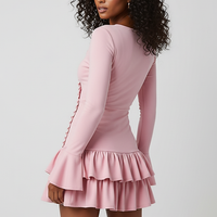 woman wearing black flare sleeve ruffle mini dress, front view, standing, hands relaxed