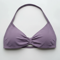 Strappy sports bra, angled view on model.