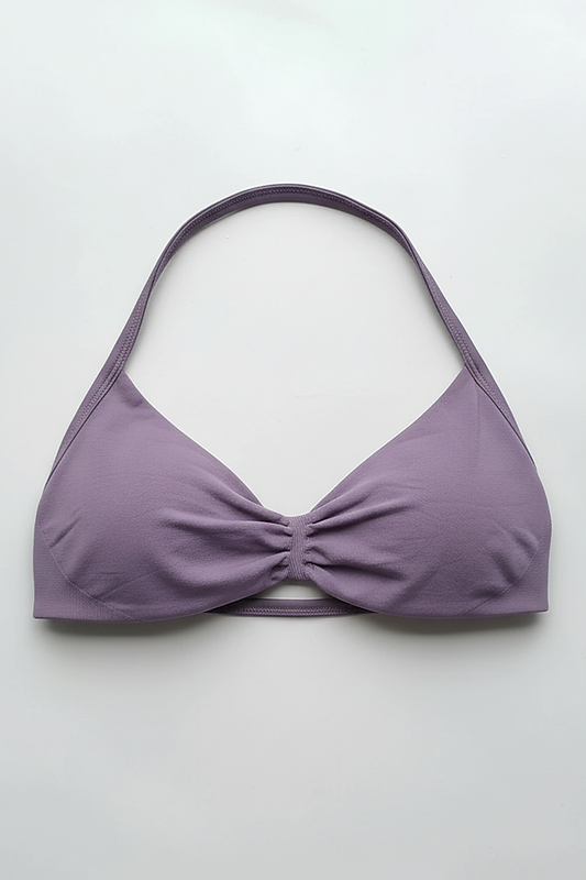 Strappy sports bra, angled view on model.