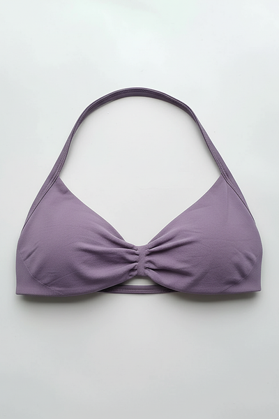 Strappy sports bra, angled view on model.