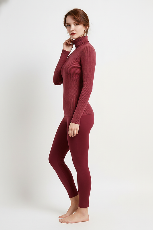 Women's knitted pullover sweater, full length back view on model.