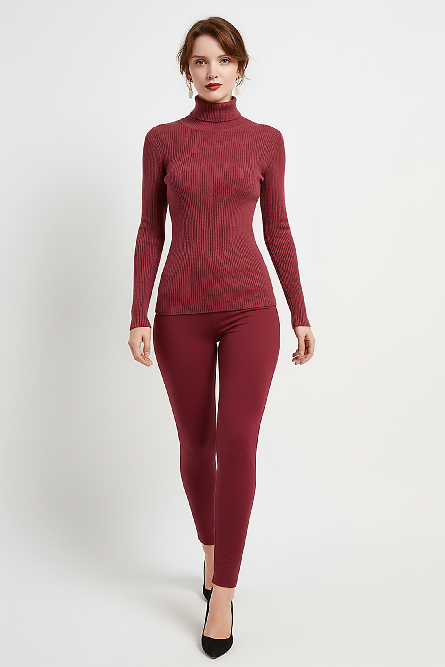 Women's knitted pullover sweater, back view on model.