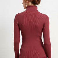 Knitted pullover sweater, close-up fabric detail.