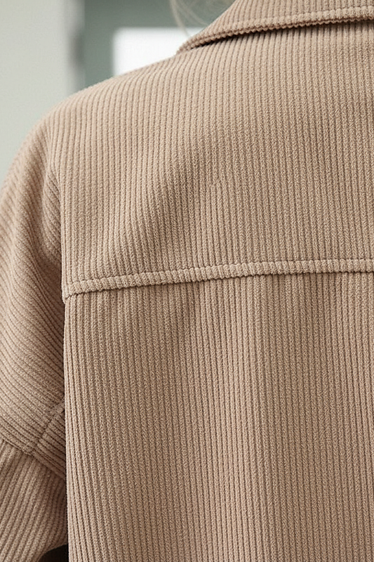 Cropped corduroy jacket, single-breasted, lantern sleeve, button detail.