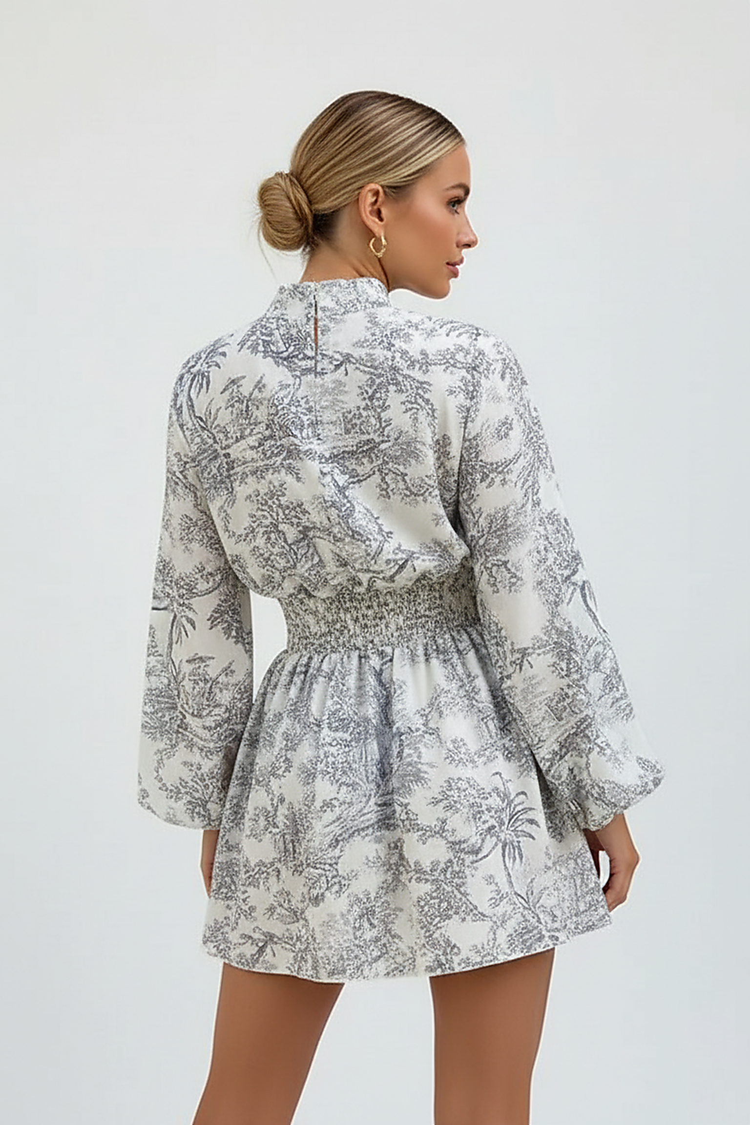 Elegant dress, side view on model.