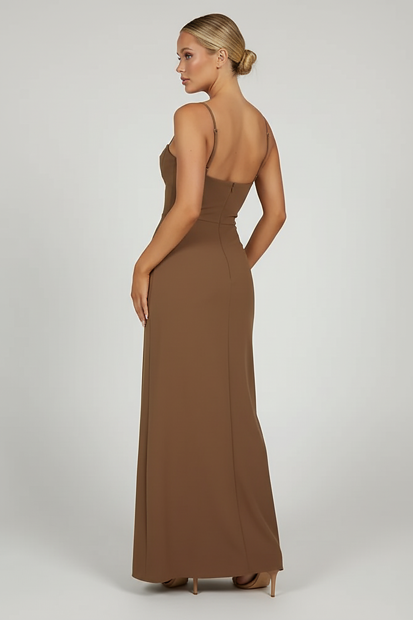 Black mesh spaghetti strap dress, close-up fabric detail.