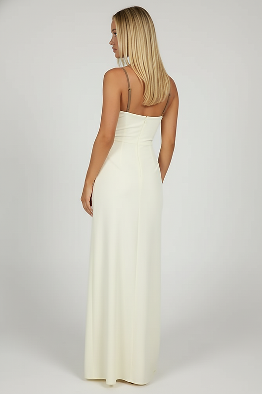 Black mesh spaghetti strap dress, side view, model looking away.