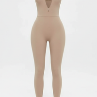 Red sporty jumpsuit, front view on model.