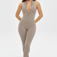 Grey sporty jumpsuit, front view on model.