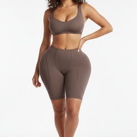 Shapewear butt lifter panties, front view on model.